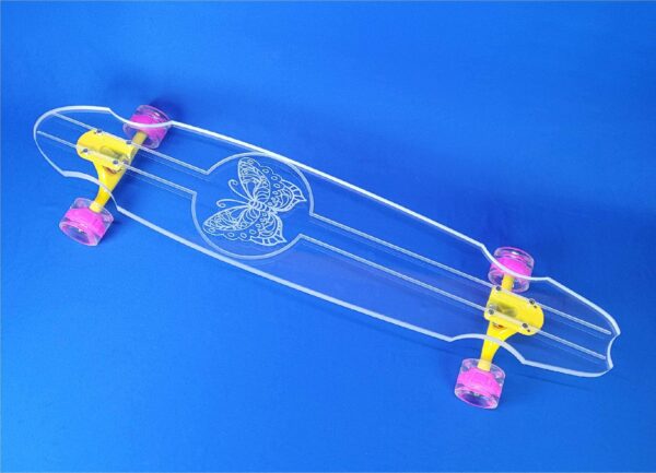 A clear 40-inch longboard with a butterfly engraved onto it by Ghost Boards. Sold with custom trucks and wheels. Check out our LED longboard wheels!