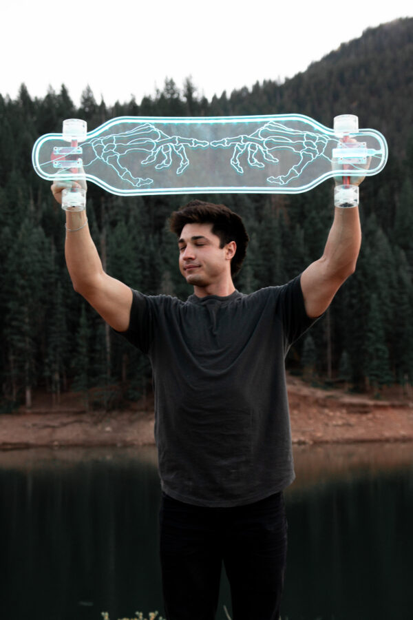 Electric LED Skeleton Hands Custom Ghost longboard. Clear acrylic skateboards